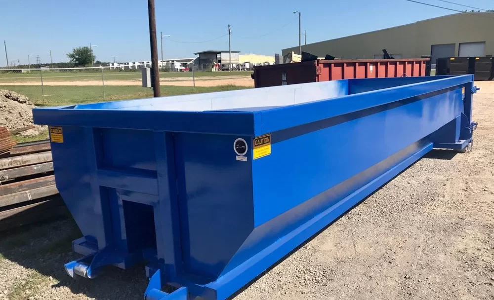 a large blue roll off dumpster